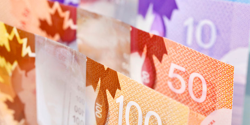 Ottawa reducing value of money and spending billions