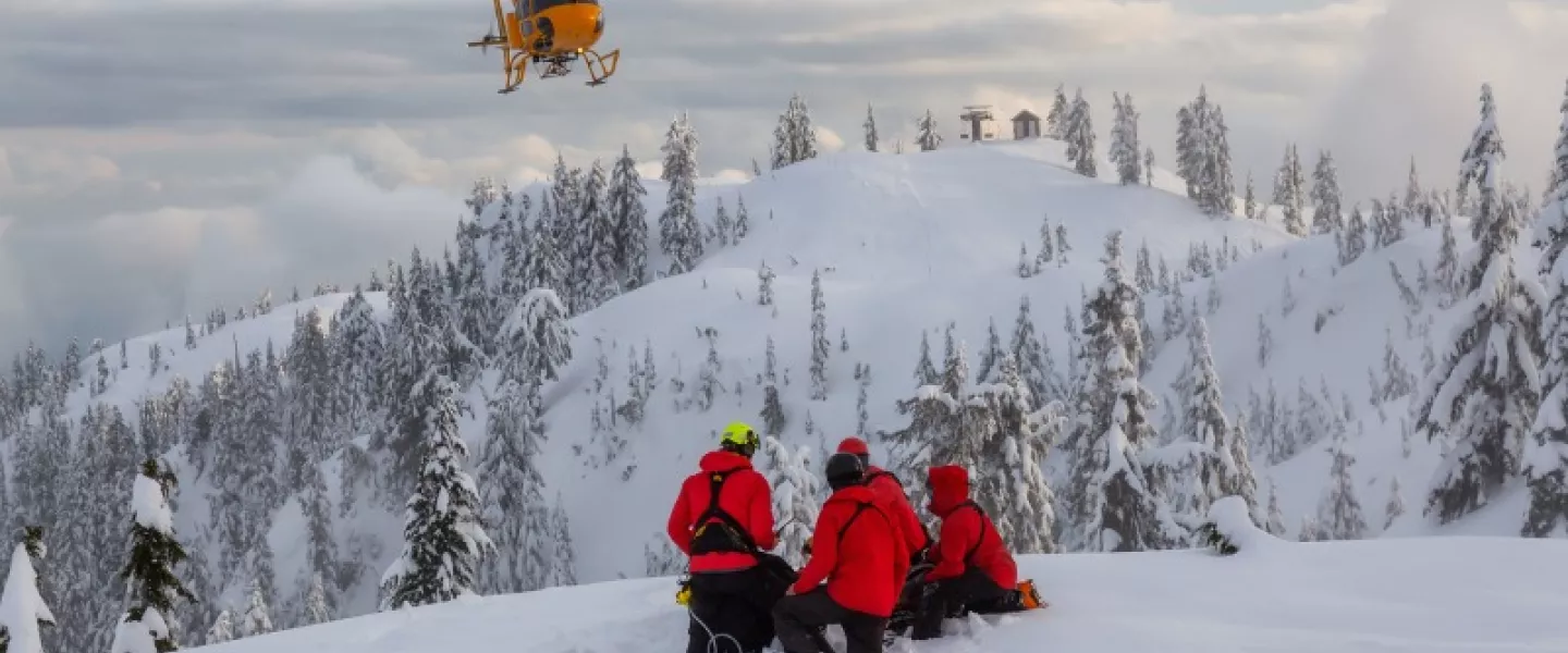 search-and-rescue-are-rescuing-a-man-skier-in-the-backcountry.jpg