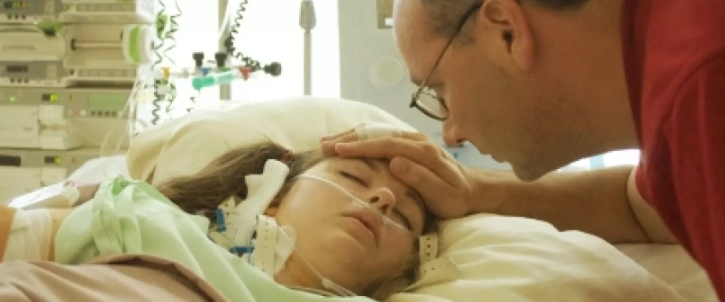 woman-in-hospital-bed.jpg