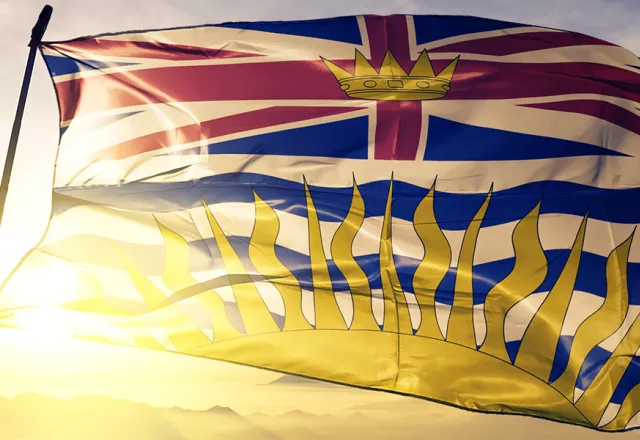 BC Flag with sunshine background