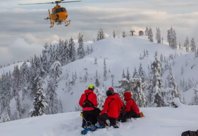 search-and-rescue-are-rescuing-a-man-skier-in-the-backcountry.jpg